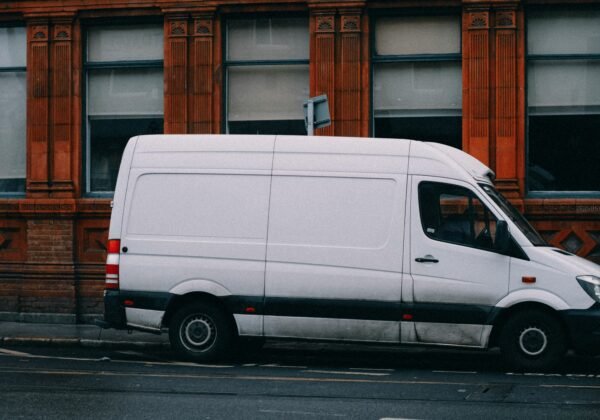 a white van parked on the side of the road