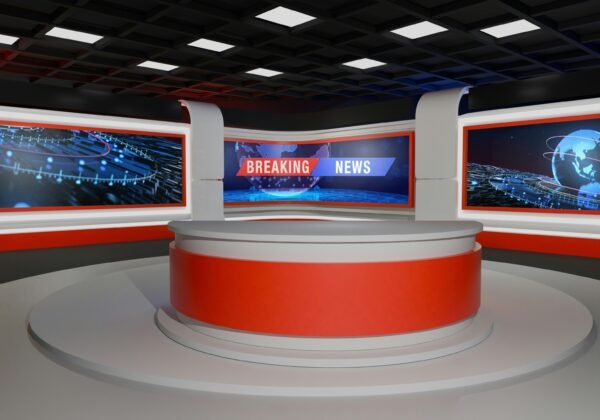 This is a modern, professional news studio set.