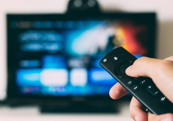 turned-on flat screen television